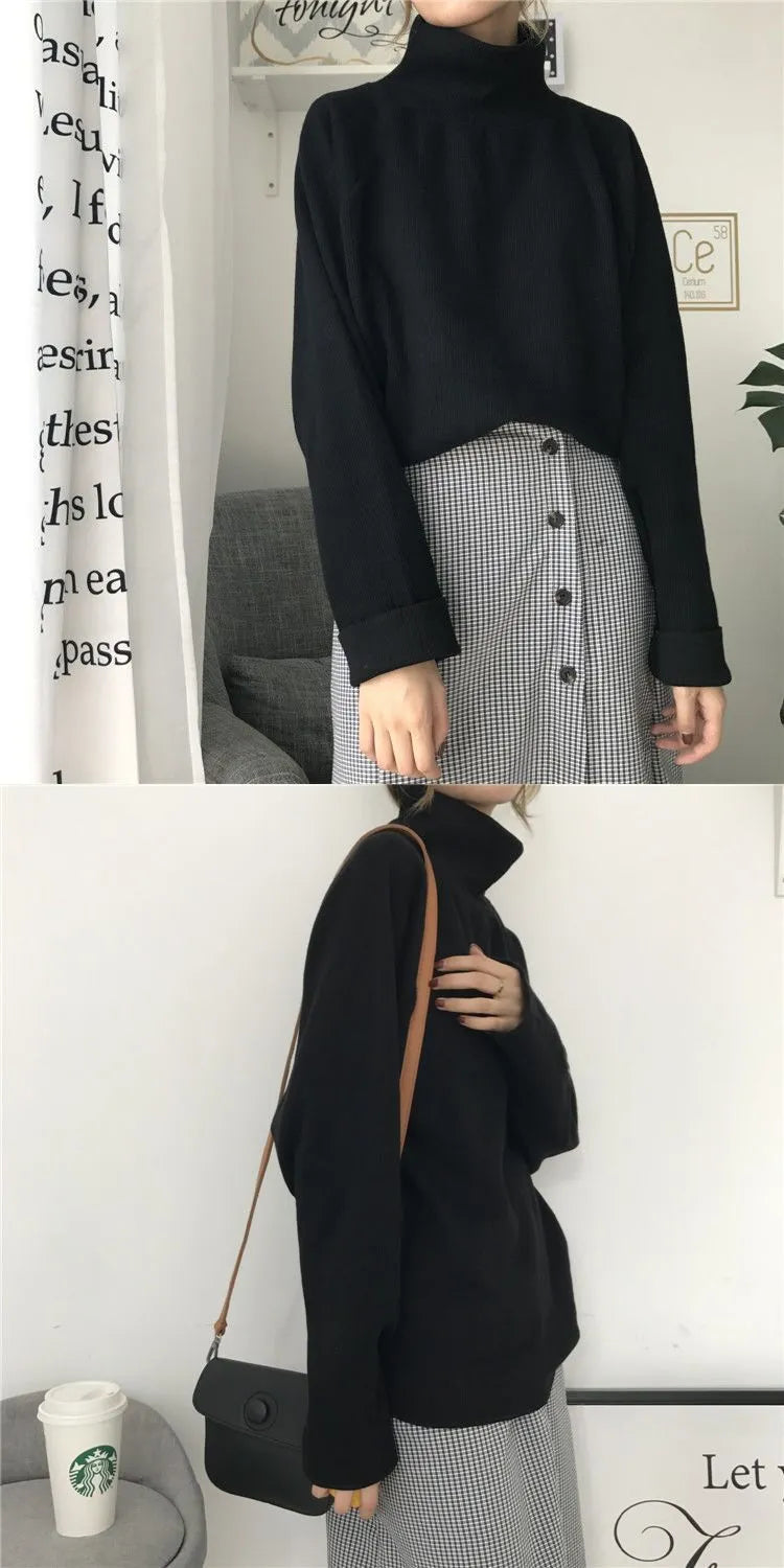Women's loose-fitting long sleeve top with a half-high collar in a solid colour.