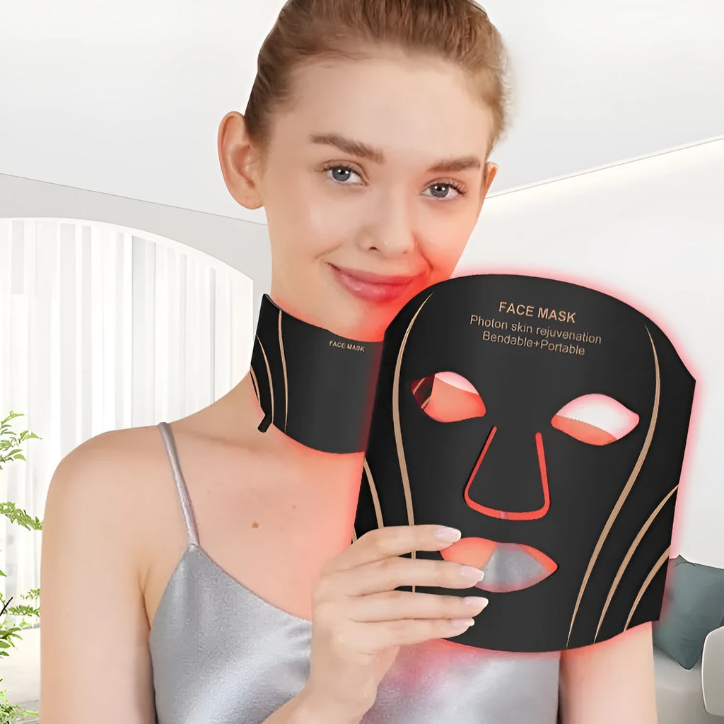 Black gold IPL LED facial mask device with headband and touch screen on a white background.