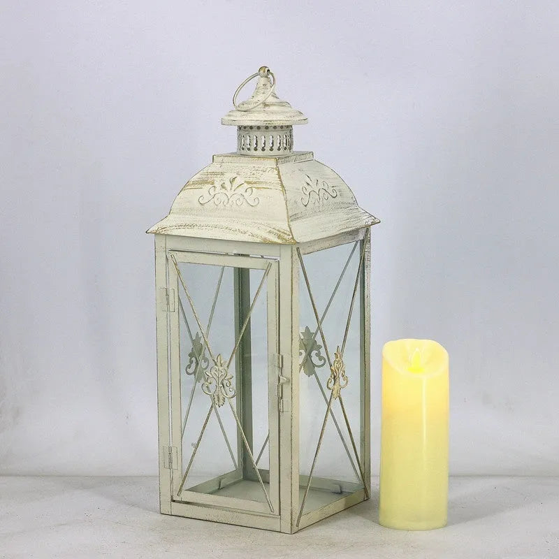 Black and white gold wrought iron storm lantern with tempered glass in three sizes for courtyard decoration.