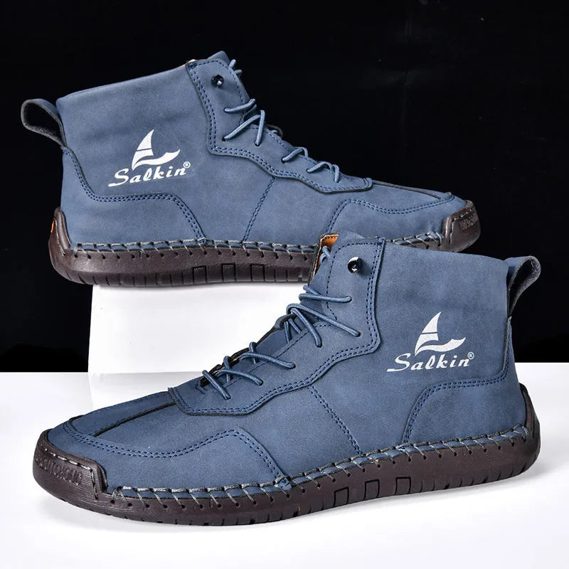 Casual high-top leather boots with elastic band closure and flat heel in beige colour with visible sewing detailing
