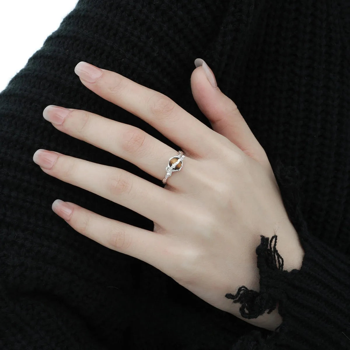 Silver Saturn planetary motif open ring with adjustable size and white gold electroplated finish