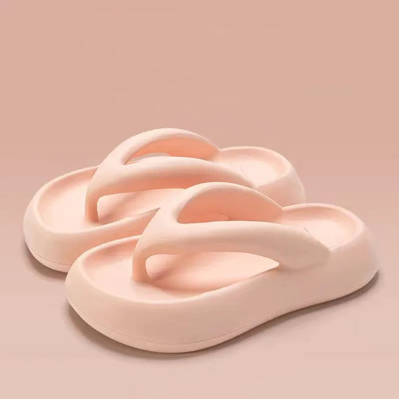 Solid colour thick-soled EVA flip-flops with decorative bow on strap.