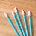 Disposable lip brushes with coloured handles and flocked brush heads for lip makeup application