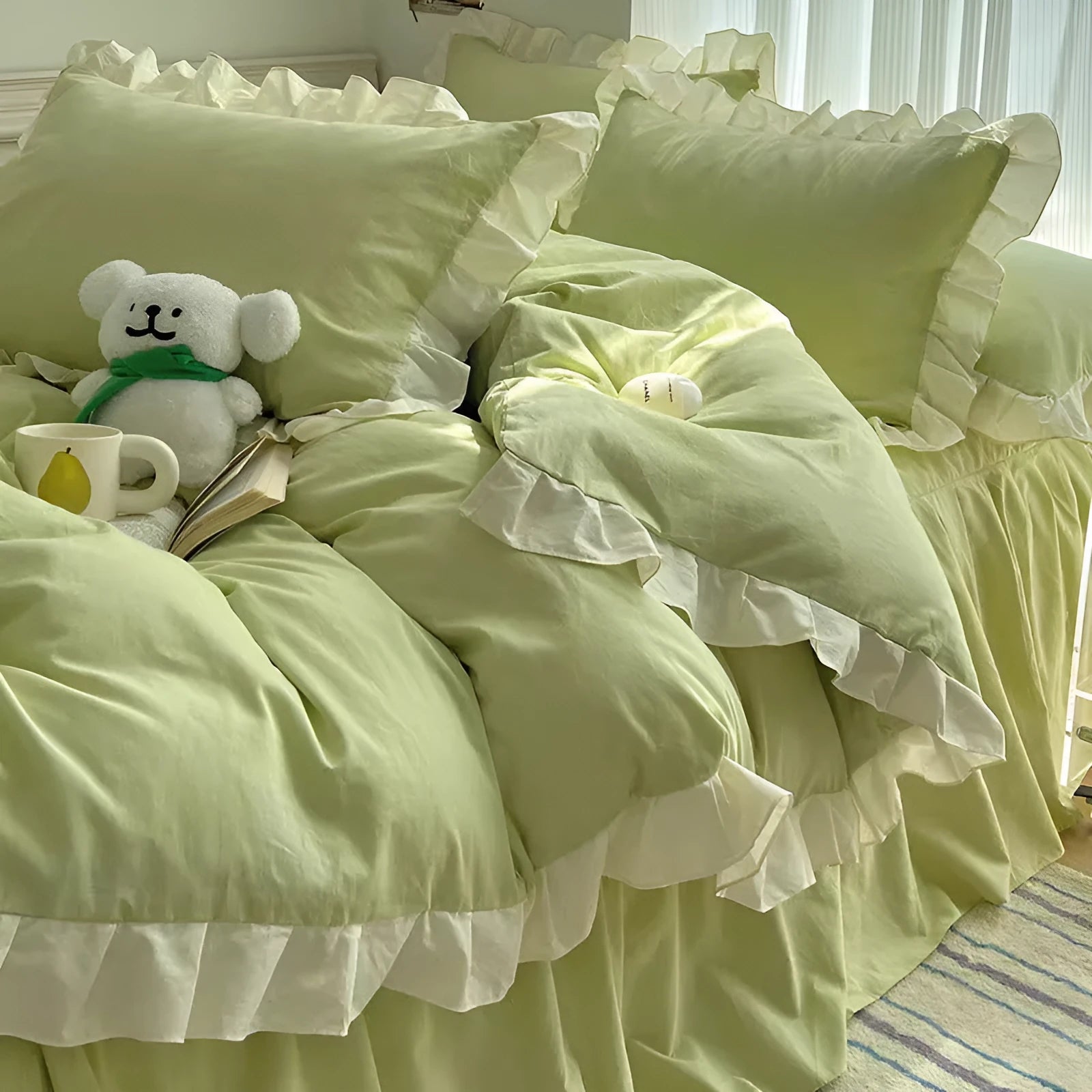 Solid colour washed linen quilt cover and pillowcases from a mori style four-piece bedding set.