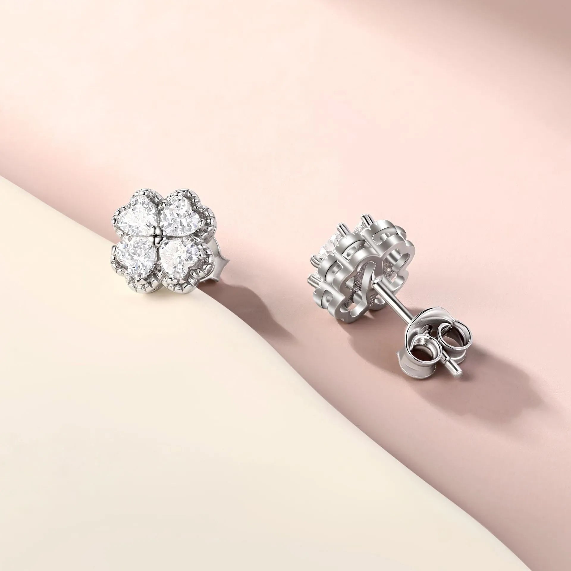Zeng Yin women's 925 silver heart-shaped earrings with white zircon stones in white gold colour.