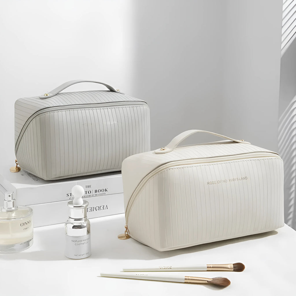 Beige cubic PU vertical pattern pillow makeup bag for travel, showing dimensions of 22.5cm by 12.5cm.