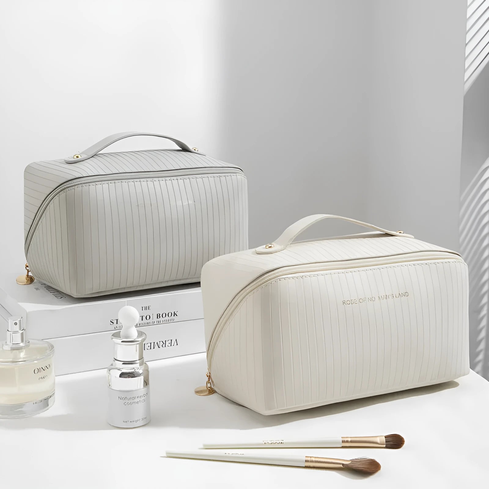 Beige cubic PU vertical pattern pillow makeup bag for travel, showing dimensions of 22.5cm by 12.5cm.