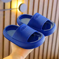 Children's bright coloured EVA slippers with non-slip soles in blue, green, orange, pink, and yellow.