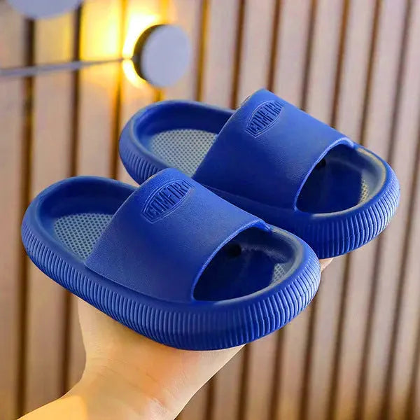 Children's bright coloured EVA slippers with non-slip soles in blue, green, orange, pink, and yellow.