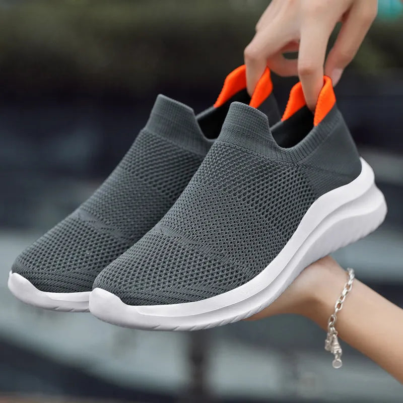 Men's breathable mesh running shoes with MD sole, available in multiple colours, side view on white background