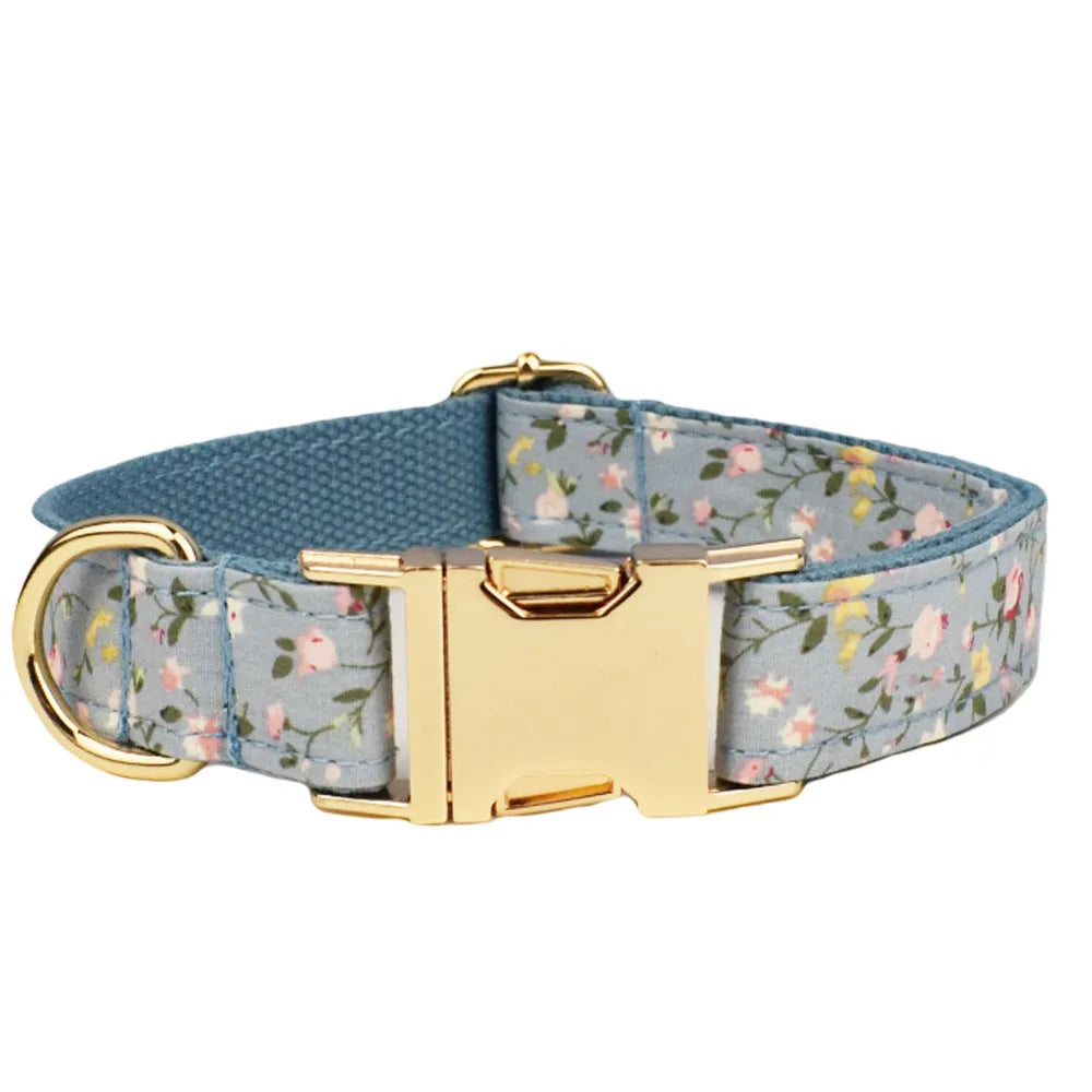 Floral pattern dog collar set with leash, vest, bow, and poop bag holder in five coordinated pieces