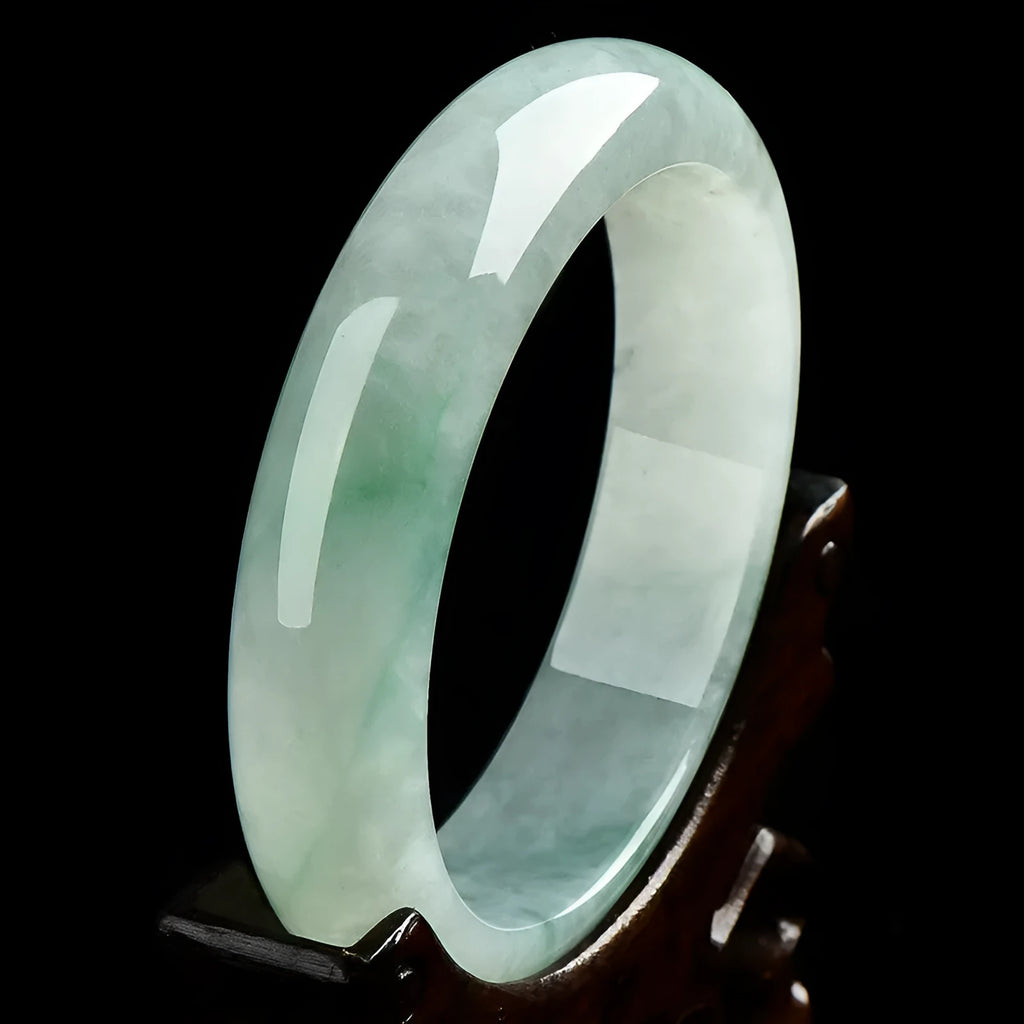 Light green jade bracelet showing natural stone material and simple design for unisex wear