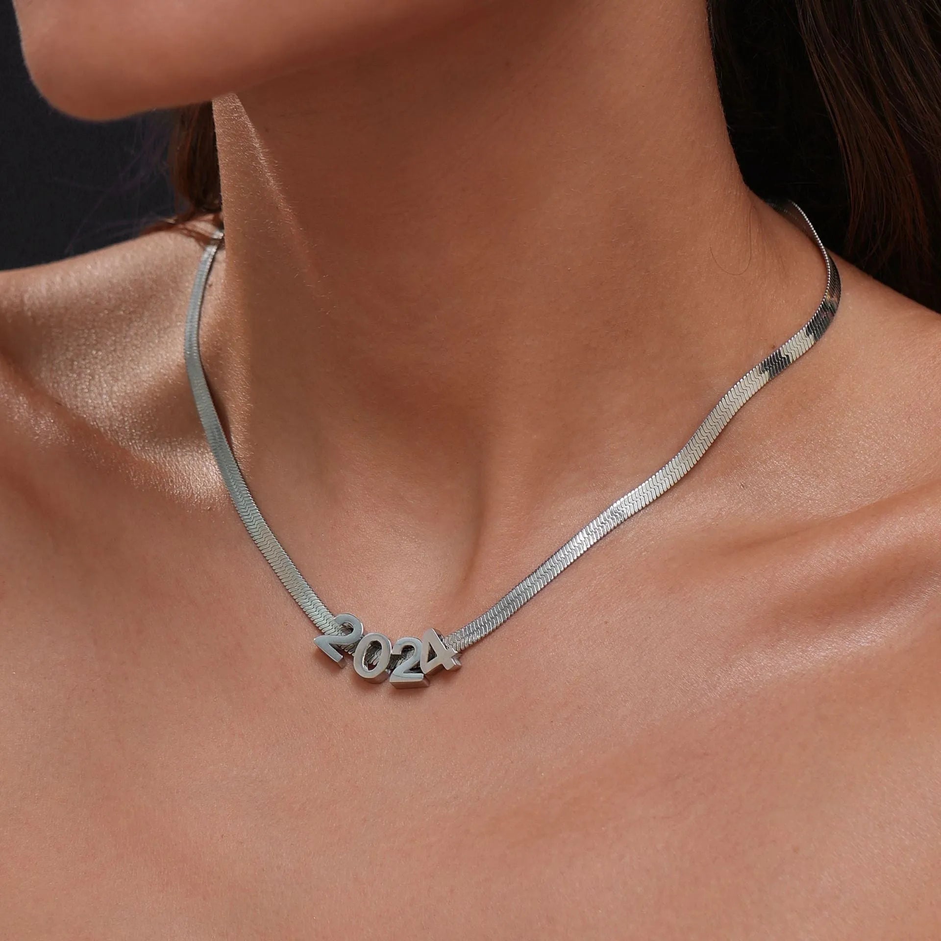 Gold electroplated titanium steel necklace with the letter 'A' pendant on a 40.5cm chain.