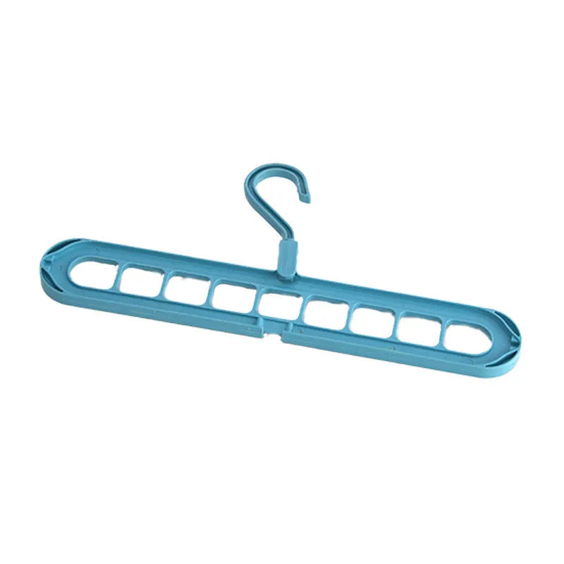 Green plastic nine-hole folding hanger for trousers displayed open and folded flat.