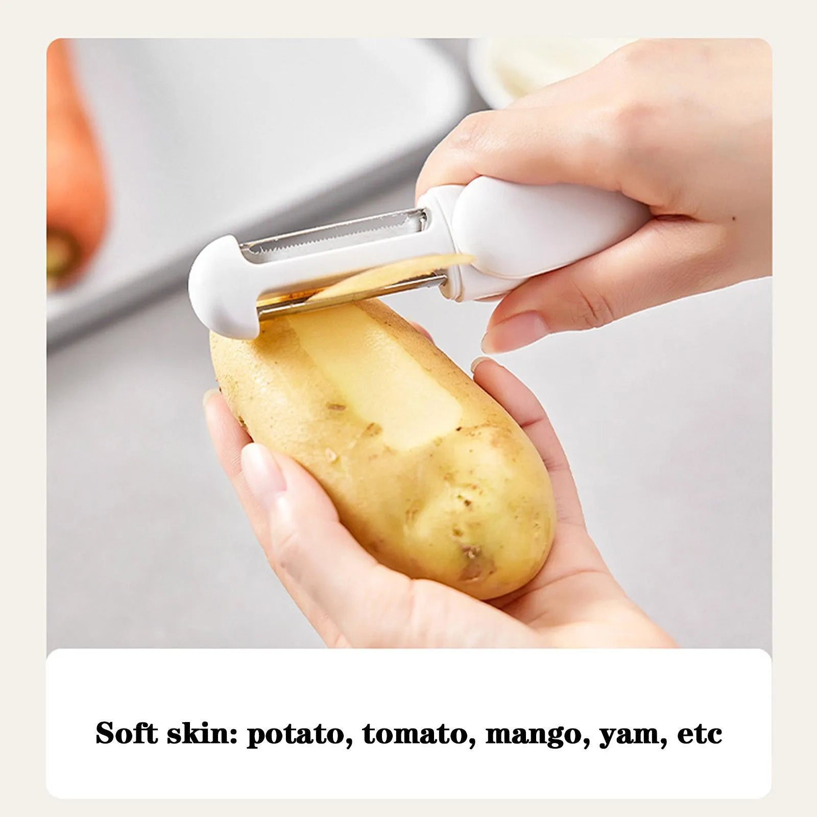 White 3 in 1 rotary paring knife with 360 degree rotating stainless steel blade on a kitchen counter