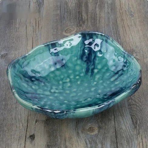 Japanese-style irregular shaped ceramic sashimi bowl with floral decorations measuring 24x21.5x7.5cm