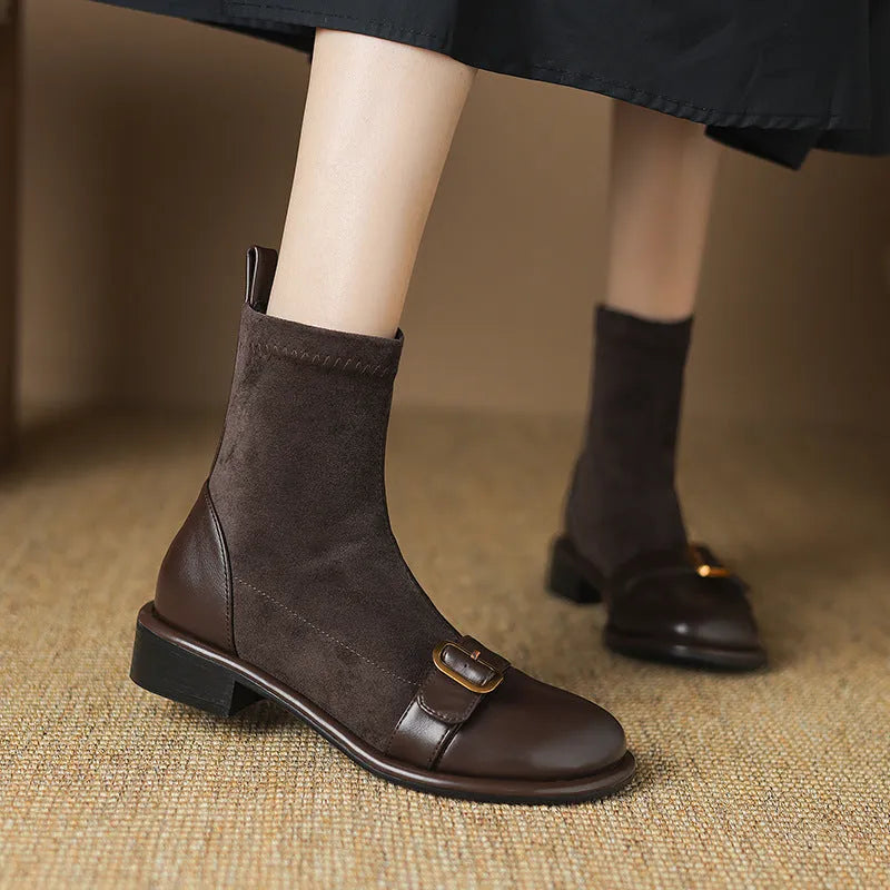 Women's black low heel Martin boots with belt buckle stitching and front lace-up design
