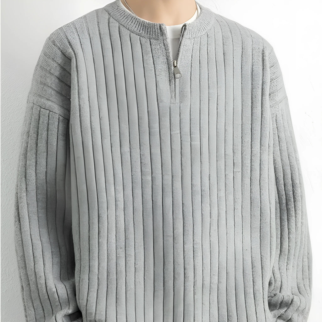 Men's grey loose-fit half zip textured knit sweater on a hanger
