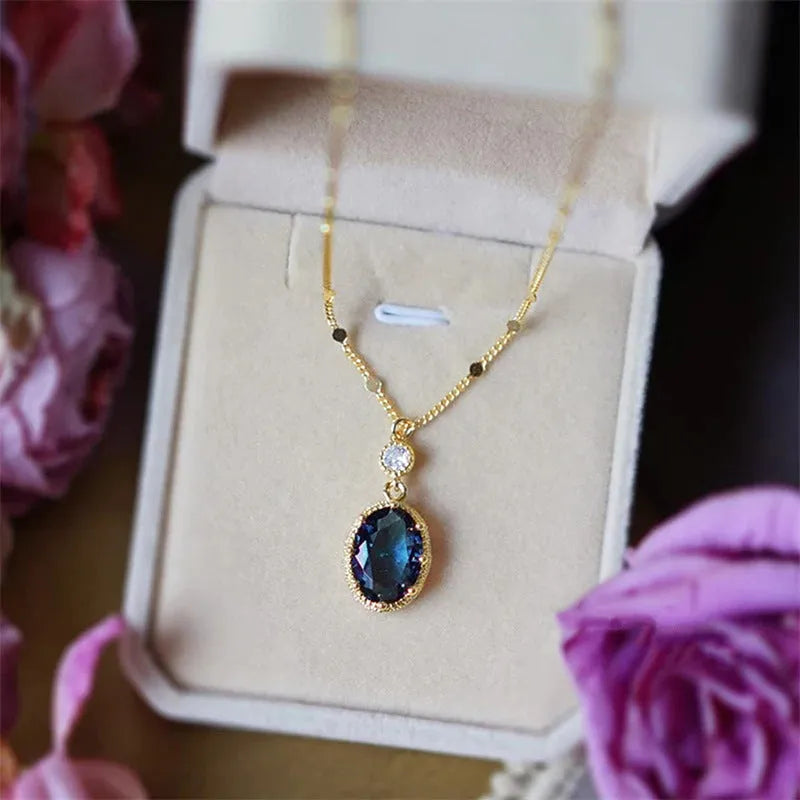 Gold geometric pendant necklace with French retro styling on copper chain