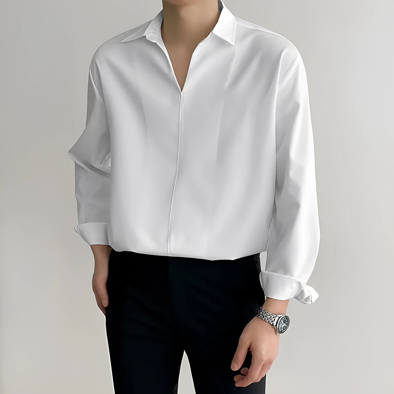Loose lapel casual pullover shirt in solid colour on a hanger.