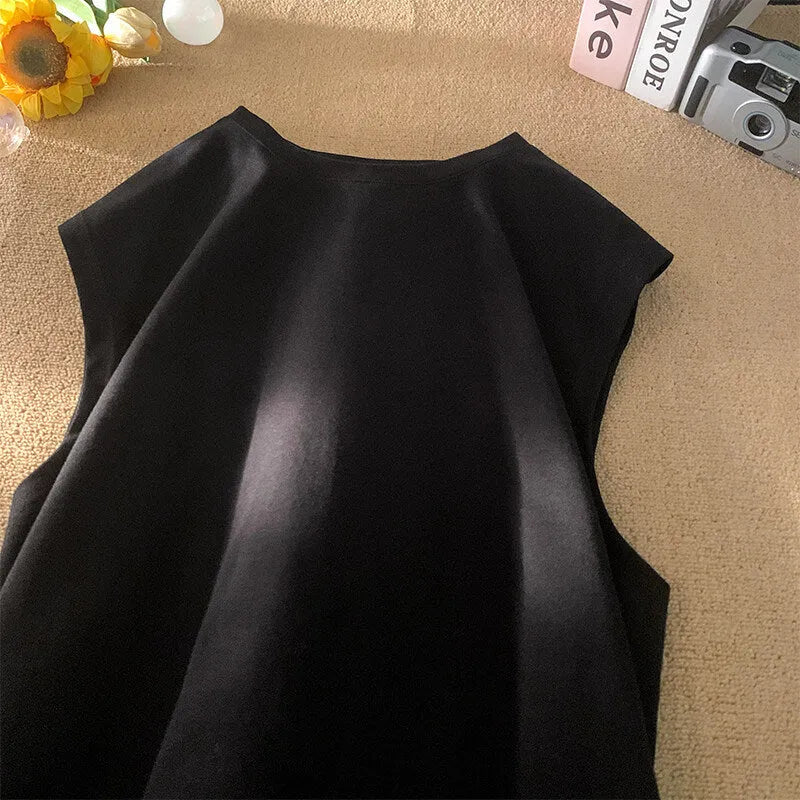Men's loose fit sleeveless cotton tank top in solid colour on a hanger