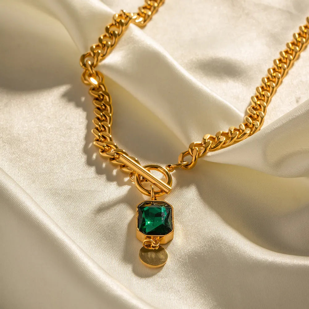 Gold colour French retro geometric pendant necklace with emerald zircon on a titanium steel Cuban link chain