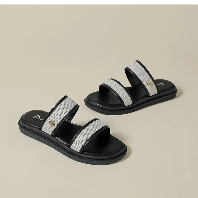 Women's vintage brown and black soft-bottom flip-flops made from artificial PU leather, showing retro strap design.