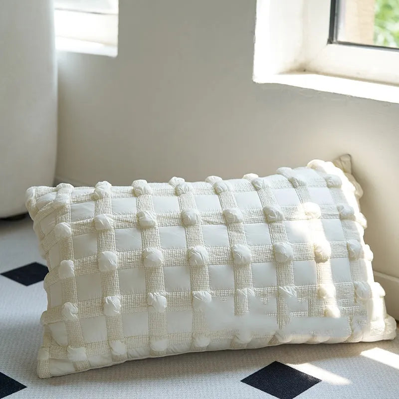 Coffee brown striped mid-century sofa cushion in Chinese classical style on a grey sofa.