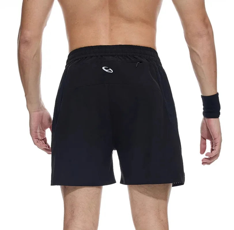 Black and blue four-point running shorts with laser punching stitching details on a mannequin.