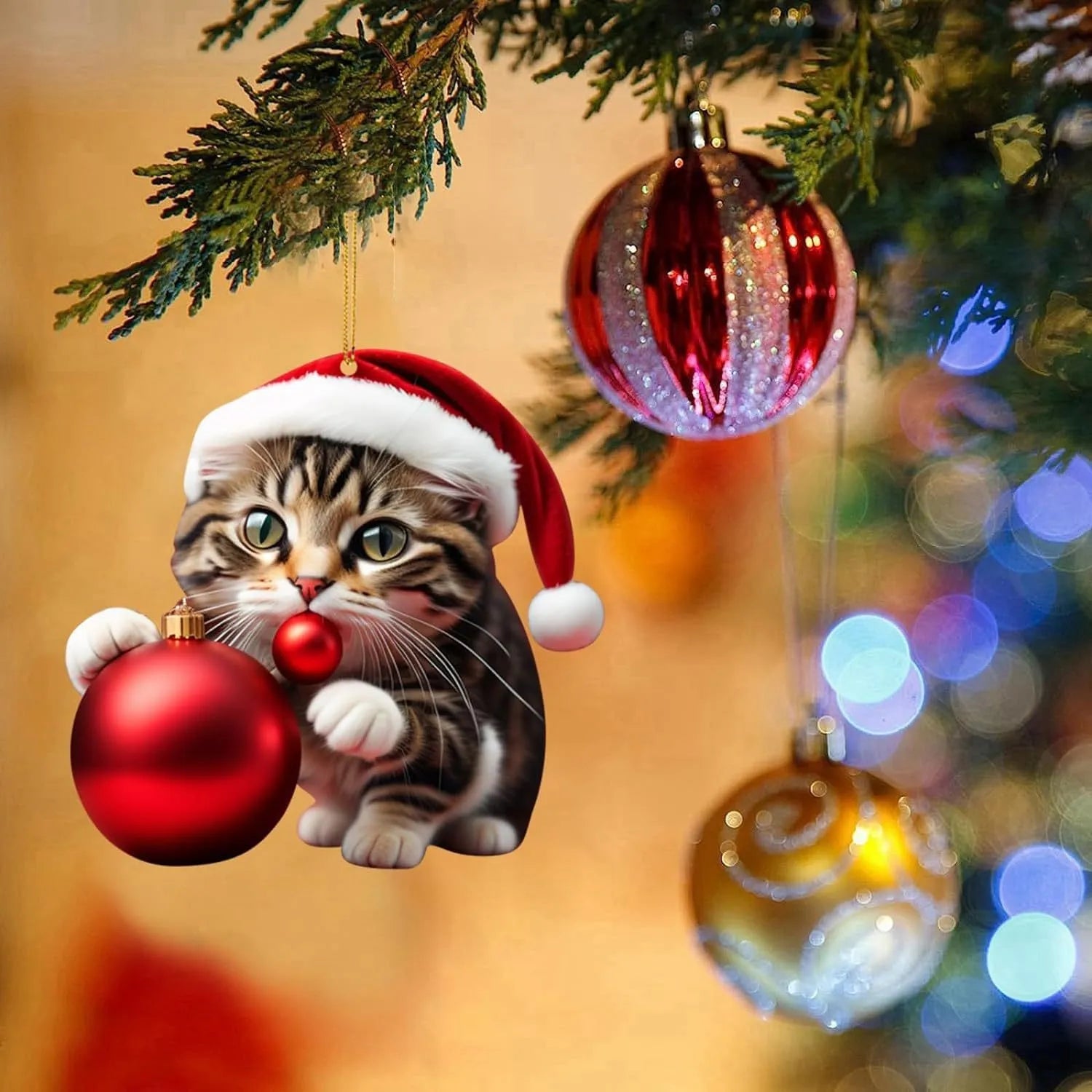 Colourful cartoon-style kitty cat Christmas ornament hanging, made from clear acrylic for car interiors.