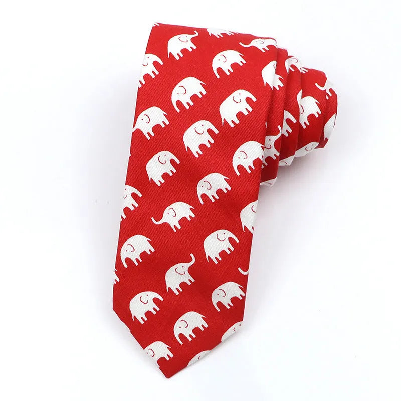 Narrow cotton bow tie with a printed cartoon pattern in a selection of colours.