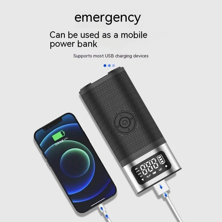 Black portable wireless air pump with USB charging cable, inflation tube, and a set of nozzles on a grey background.