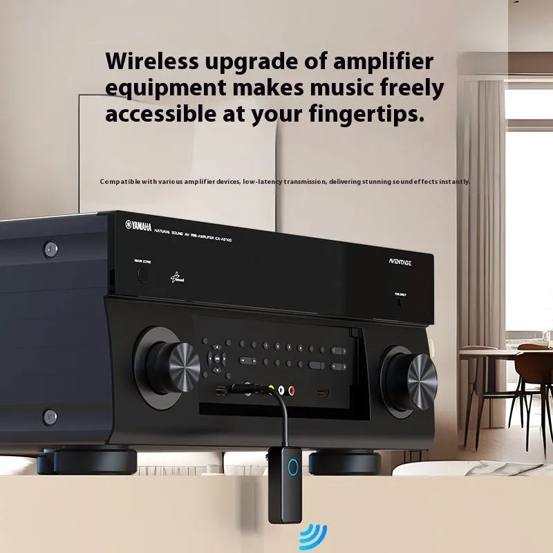Small black Bluetooth audio adapter with a 3.5mm plug for wireless music streaming.
