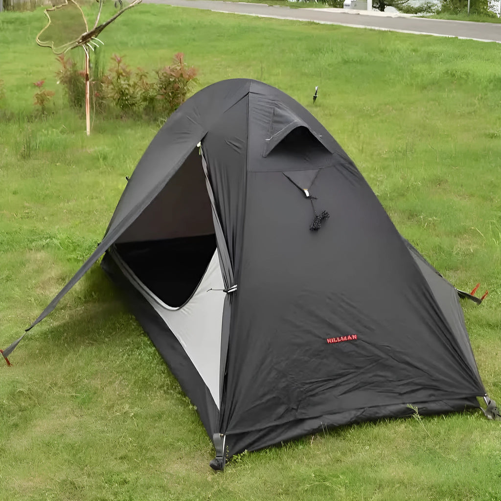 Single person hiking tent with aluminium poles shown in red colour with mesh ventilation panels visible