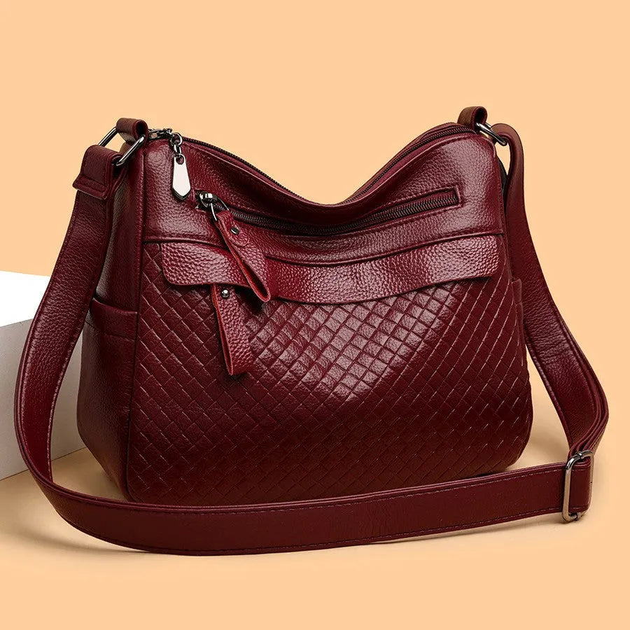 Women's soft PU leather crossbody bag in black with diamond pattern stitching, vertical rectangle shape 28x22x11cm