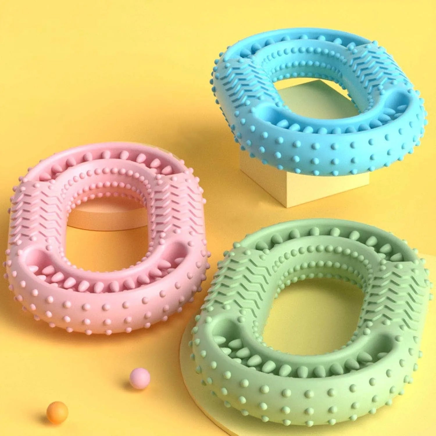 Blue O-ring shaped rubber dog chewing toy for aggressive chewers dental benefits