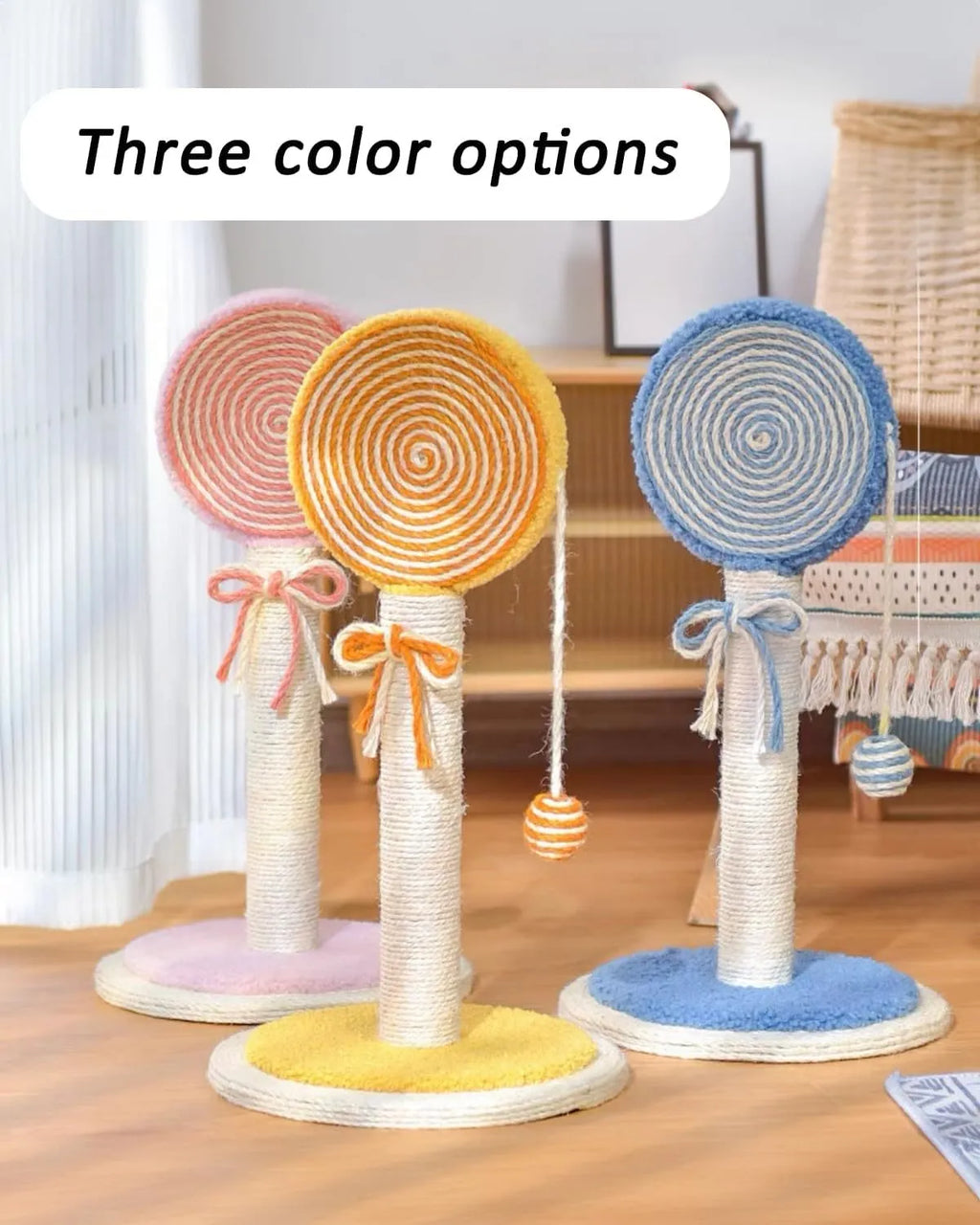 Blue cat scratching post with sisal rope and a hanging toy ball on a sturdy wooden base