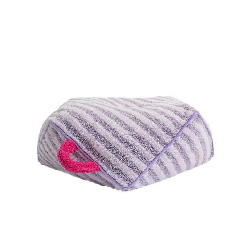 Striped orange soft velvet pet bed with a removable washable cover for dogs and cats.