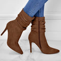 Women's pointed toe stiletto heel ankle boots with side zipper, suede upper, in black colour, car suture detailing