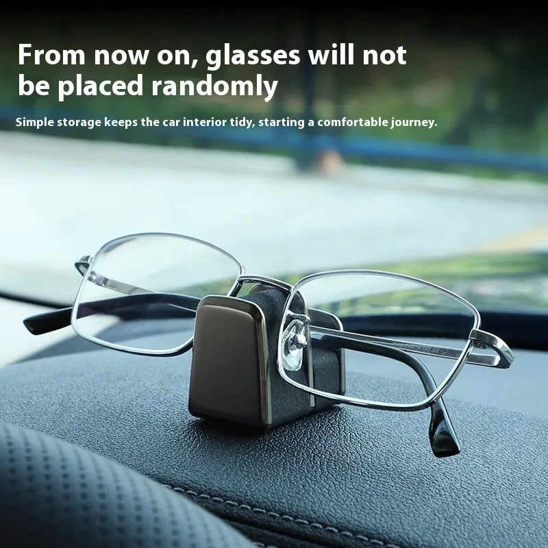 Zinc alloy and leather car dashboard sunglasses clip holder in green, black, grey, or red.