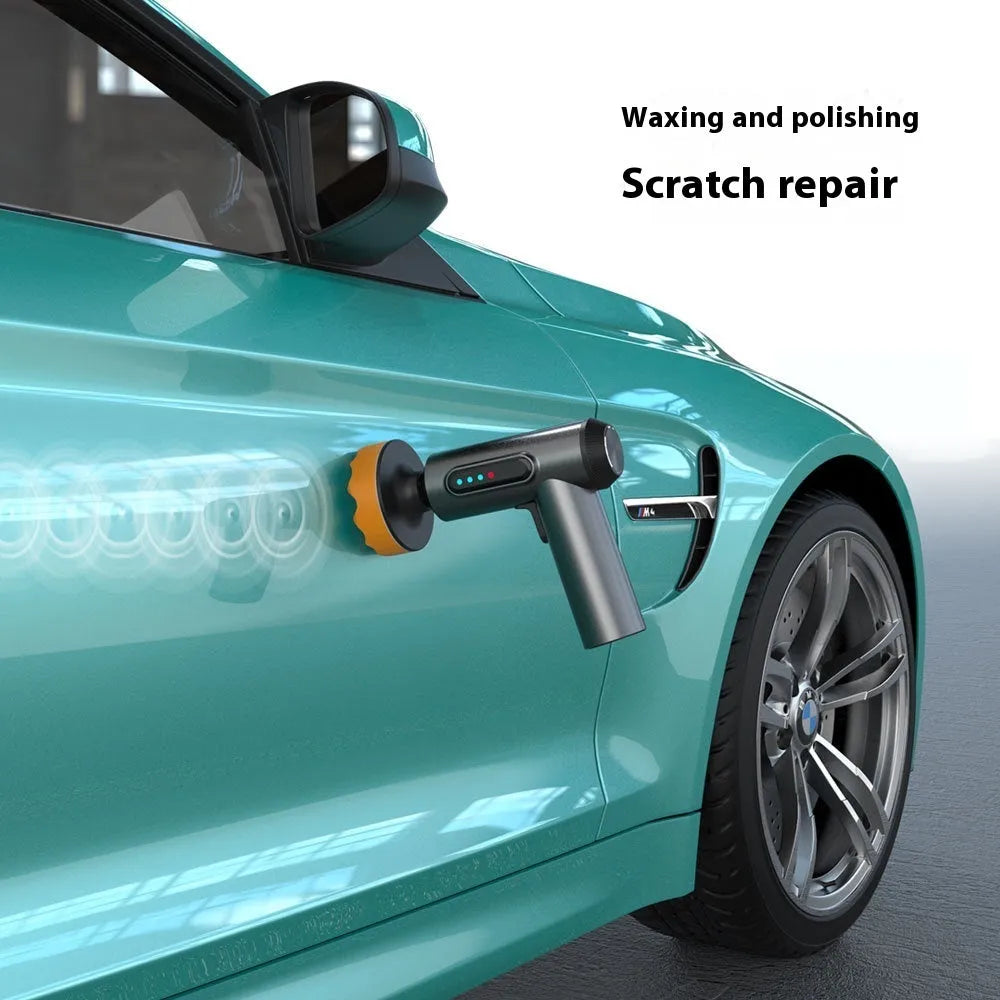 Wireless car polishing machine with three pads and charging cable on workbench