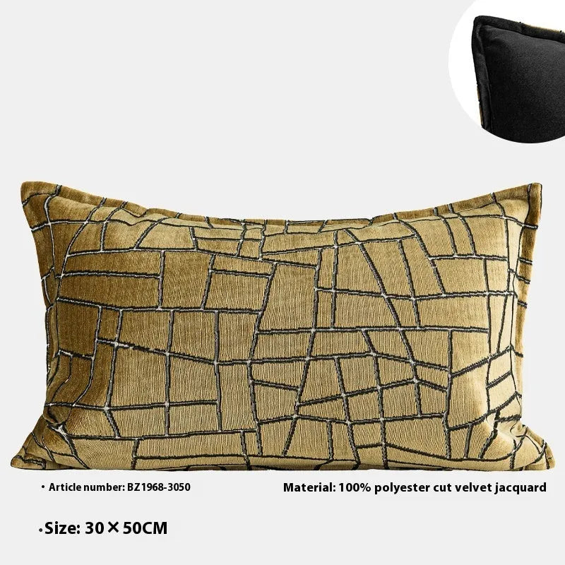 Gold geometric abstract pattern on a square polyester cushion cover with tassel detail.