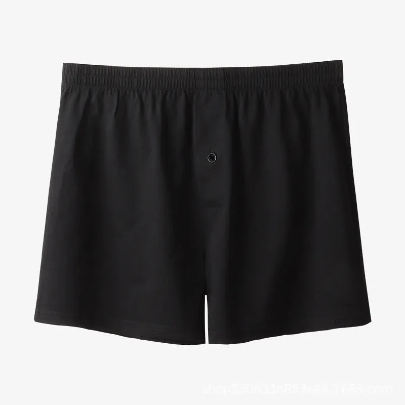 Men's light grey cotton boxer shorts with high waist and loose fit design