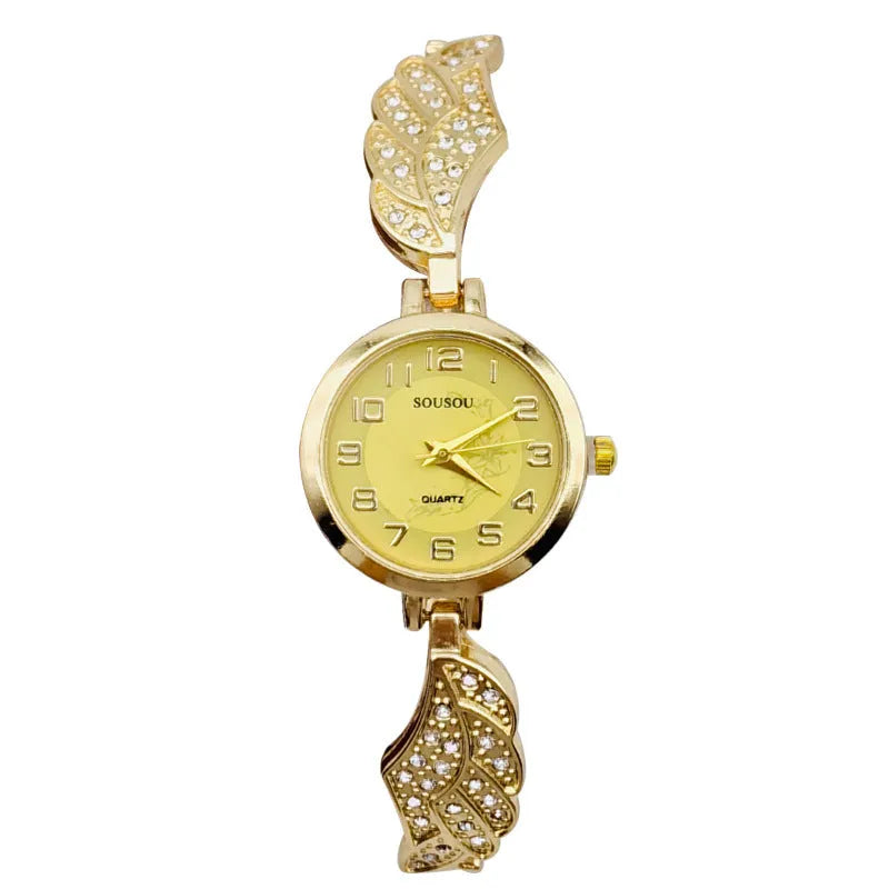 Stainless steel women's watch with round dial on a wrist, showing the Vachette clasp buckle.