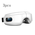 Black rechargeable eye massager with LCD screen, adjustable headband, and Bluetooth music player showing air pressure and hot compress functions