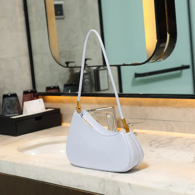 Women's retro oval underarm bag in PU leather with single shoulder strap and sandwich pockets