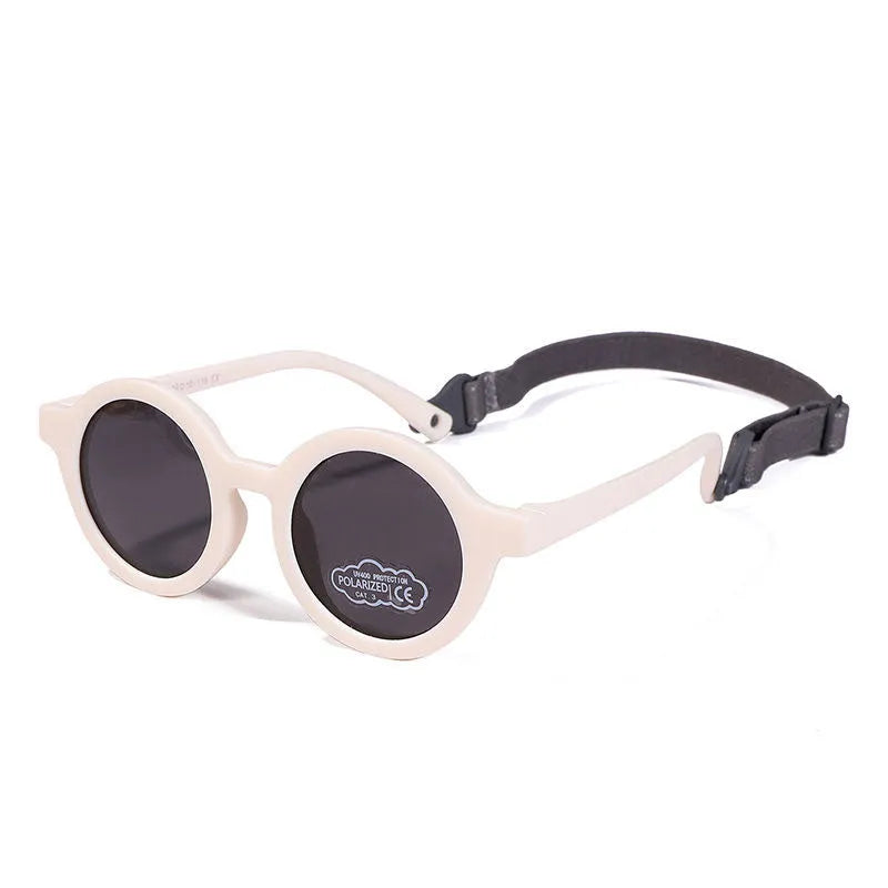 Children's round sunglasses for 0-3 year olds with UV400 protection, shown in a selection of colours.