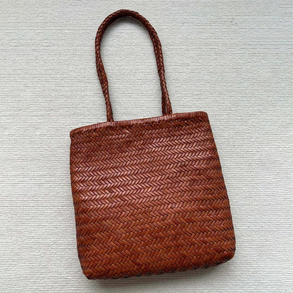 Brown woven cowhide leather shoulder bag with three-dimensional outer pocket