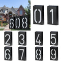 Solar powered outdoor house number light with LED illumination and concealed mounting design