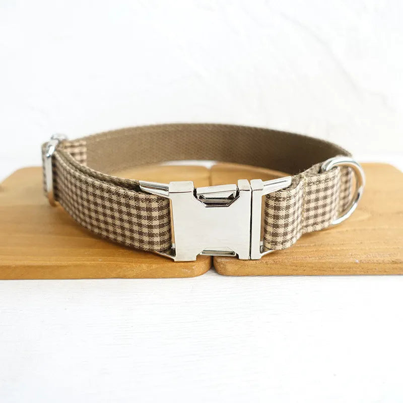 Pet leash and bow set in coffee grid polyester, available in sizes XS to XL